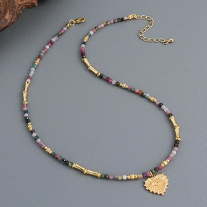 Colorful tourmaline beaded necklace with gold heart evil eye pendant and bamboo tubes