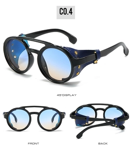 Detail of vintage steampunk sunglasses with leather side shields and gradient lenses