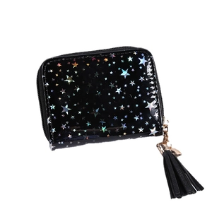 Minimalist black PU leather small wallet with holographic stars and tassel charm on white background