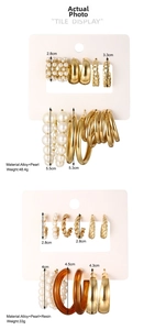 Detailed view of C-shaped hoop earring sets featuring pearls, metal chains, and resin