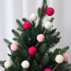 3cm wool felt balls in pink and white used as decorative Christmas tree garland ornaments