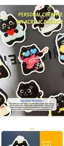 Détail de broches en acrylique chat noir avec film protecteur et impression recto-verso