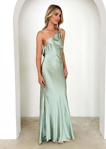 Detail of mint green satin one-shoulder long dress with smooth silky texture for women