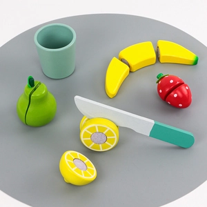 Wooden play food set for kids with sliceable fruit models and a wooden knife toy