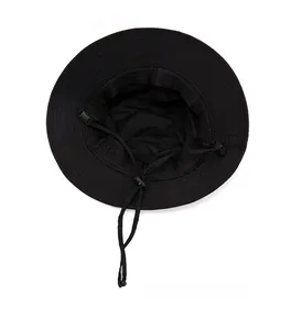 Detail of outdoor sun hat featuring breathable mesh lining and adjustable chin strap