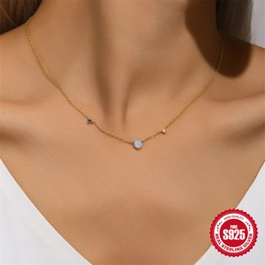 Elegant S925 sterling silver opal necklace with small diamonds on a model's neck