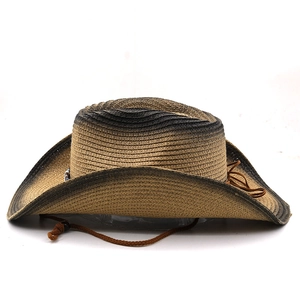 Detail of woven straw cowboy hat showing gradient texture, beads, and adjustable chin strap