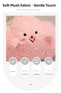 Close-up of soft pink cloud plush toy showing high-quality fuzzy texture and embroidery
