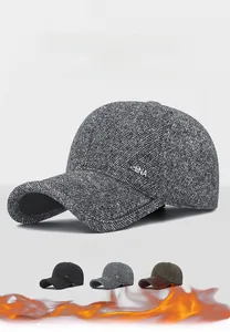Close-up of wool textured fabric and metallic CHINA emblem on the men's winter cap