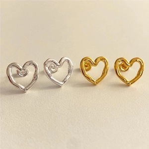 Minimalist 925 sterling silver hollow heart studs in silver and gold lava texture