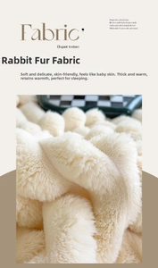 Detailed view of plush rabbit faux fur fabric in creamy white with a soft texture