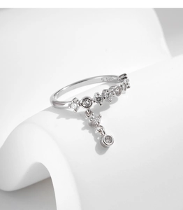 Macro view of S925 sterling silver ring with geometric pendant and sparkling zircons