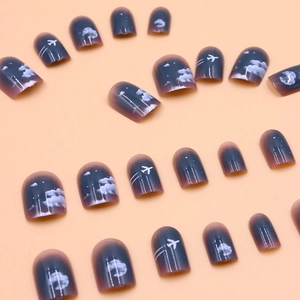 Navy blue gradient press-on nails with white airplane and moon patterns, 24 piece set