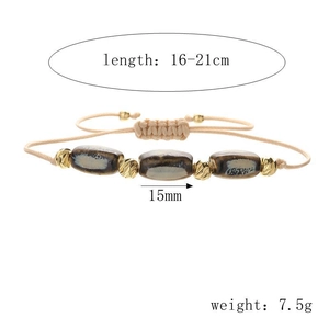 Detail of woven watermelon bead bracelet showing dimensions 16-21cm and 7.5g weight