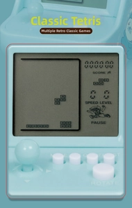 Macro detail of a light blue mini retro arcade game keychain with functional buttons