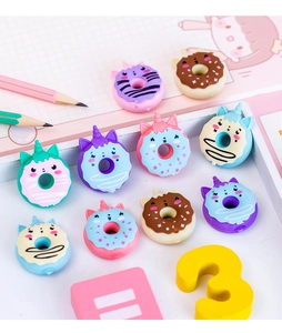 Close-up of colorful unicorn donut erasers in various pastel shades for school