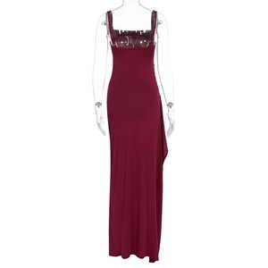 Detailed back view of burgundy slim fit maxi dress with thin straps and side draping