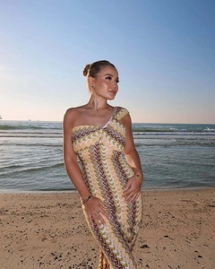 Close-up of yellow and pink chevron lace fabric on a slim-fit one-shoulder beach dress