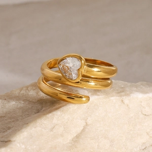 Elegant gold spiral stainless steel ring with a sparkling heart-shaped zircon stone