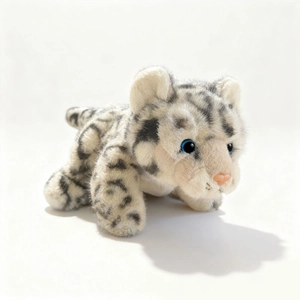 Lifelike snow leopard plush toy with blue eyes and spotted fur in lying position