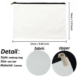 Detail view of canvas makeup bag showing 22x14cm dimensions and zipper texture