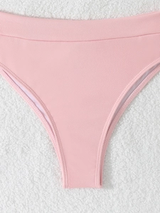 Pale pink ribbed triangle bikini bottoms with high cut leg for beach and swimming