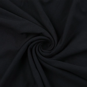 Macro di tessuto a rete nero che mostra la sua alta elasticità e il drappeggio morbido