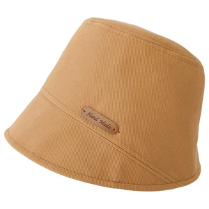 Japanese style khaki cotton bucket hat for women with handmade leather patch on white background