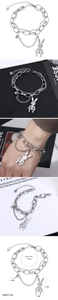 Detail view of rabbit pendant and double-layer chain bracelet with sizing measurements