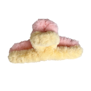 Pink and beige plush hair claw clip featuring a minimalist Korean ribbon style design