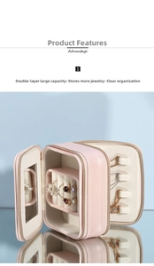 Pink faux leather travel jewelry box detail showing double layer storage and mirror