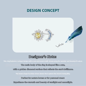 Detail of sun and moon open ring with sparkling gold and blue zircon stones