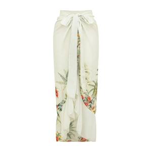 Detail of tropical plant print sarong with adjustable waist tie and asymmetric hemline