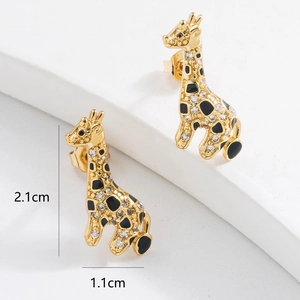 Detailed view of gold giraffe earrings with black spots and dimensions 2.1cm by 1.1cm