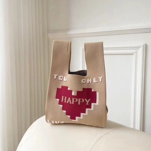 Minimalist khaki knit tote bag featuring a red pixel heart and happy lifestyle quote