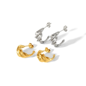 Chic twisted C-shape stainless steel earrings in gold and silver finish, minimalist style