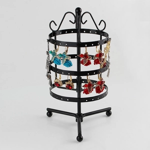 Rotating black metal earring stand with three-tier round jewelry display racks