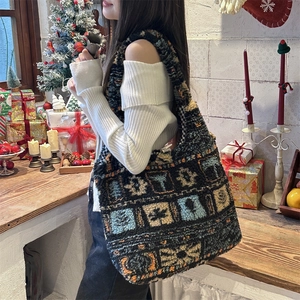 Ethnic style plush tote bag shown in a cozy Christmas scene with a warm holiday vibe