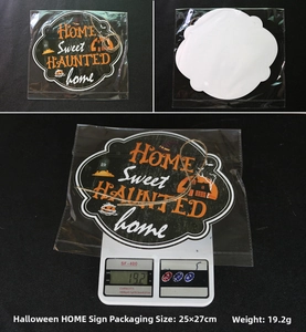 Detail view of Halloween haunted home door sign with packaging and weight measurement