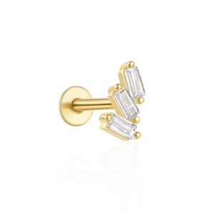Macro detail of gold S925 silver ear stud featuring three tiered rectangular gemstones