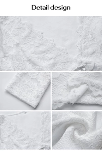 Close-up of white crochet lace trim with side ribbon bow detail on Y2K style top