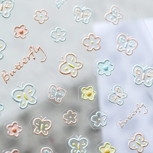 3D-Relief-Nagelaufkleber mit Schmetterlingen und Blumen in sanften Makronenfarben