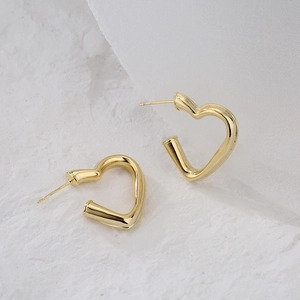 Minimalist 18K gold plated heart earrings featuring a sleek geometric open design