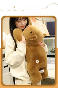 Close-up of a large soft capybara plush toy with premium fluffy texture held by a person