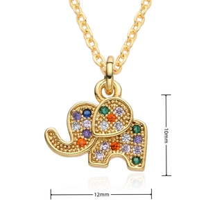 Macro shot of tiny gold elephant pendant with colorful cubic zirconia and dimensions