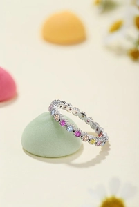 Detailed view of S925 silver ring with multi-colored round cubic zirconia stones