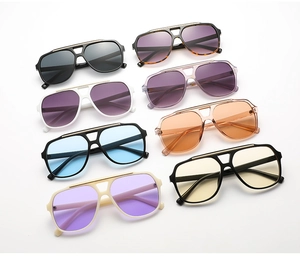 Top view of classic aviator sunglasses displayed in eight vibrant gradient lens colors