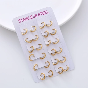 Set of 12 pairs of minimalist golden stainless steel hoop earrings in varied sizes