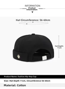 Detail view of cotton docker cap with golden leaf emblem and adjustable metal buckle