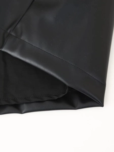 Detailed macro view of black PU leather texture with high-quality stitching and inner lining